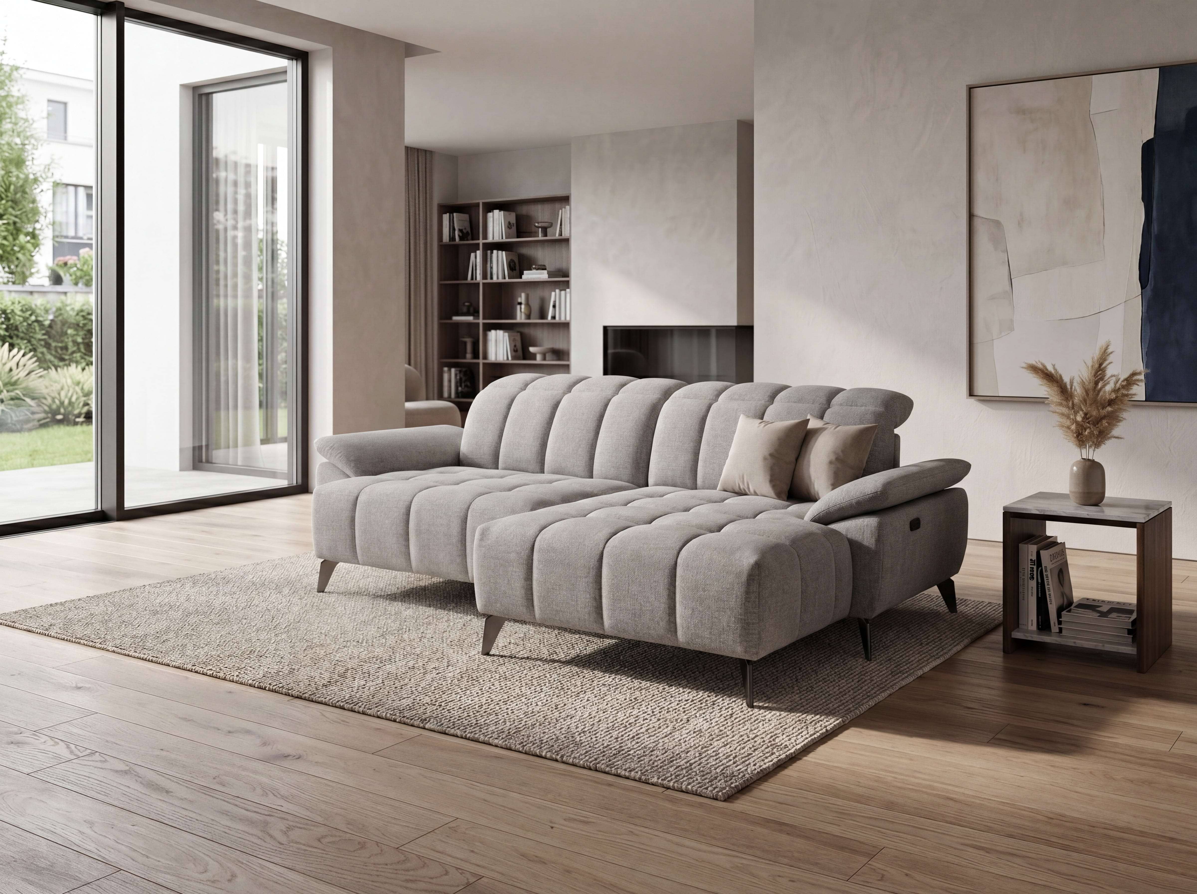Ecksofa Kabs Polsterwelt mit grauem Stoffbezug, gepolsterten Armlehnen und sichtbaren Metallfüßen