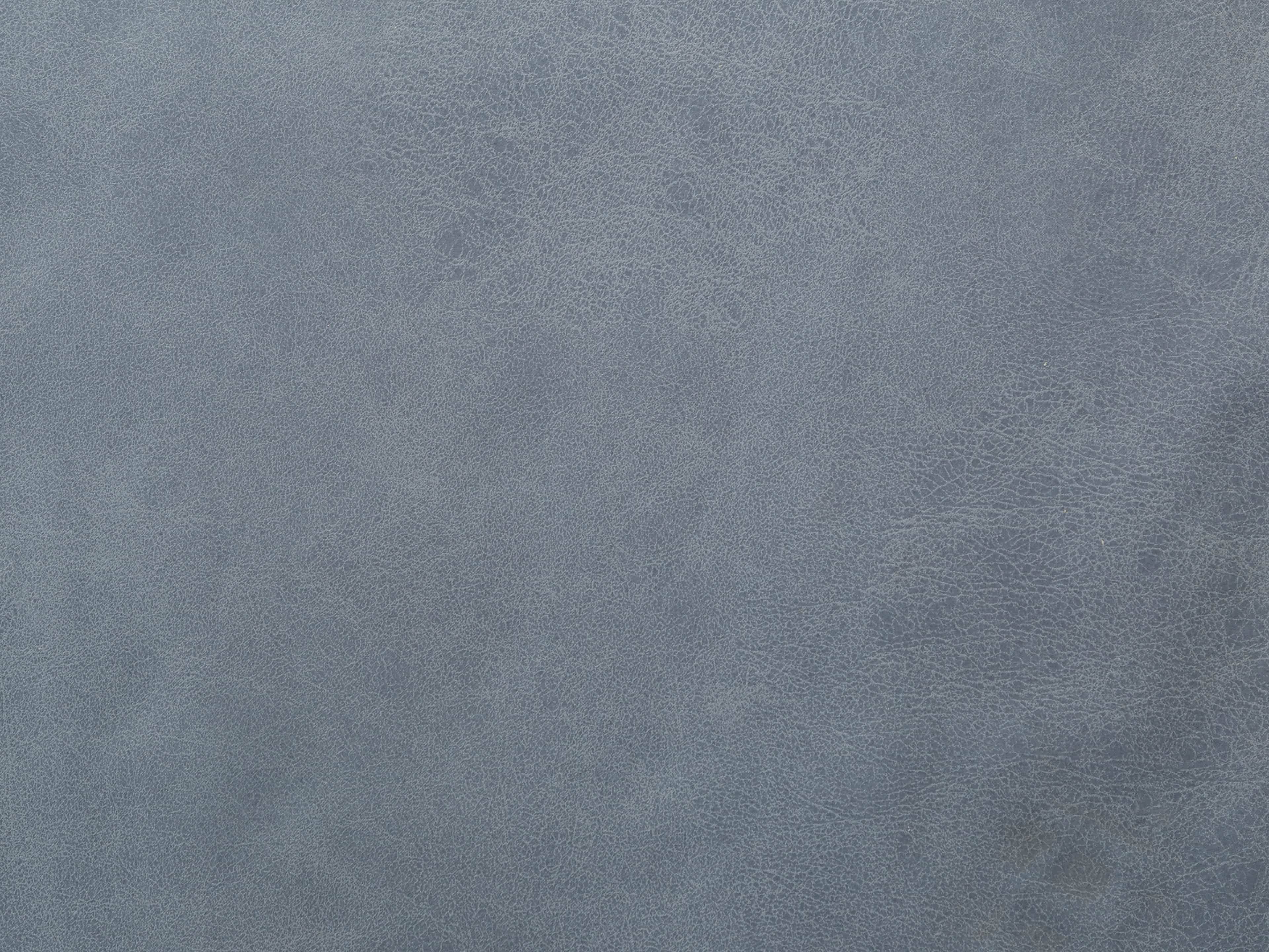 Blaue Lederoberfläche mit feiner Maserung und glatter, leicht strukturierter Textur