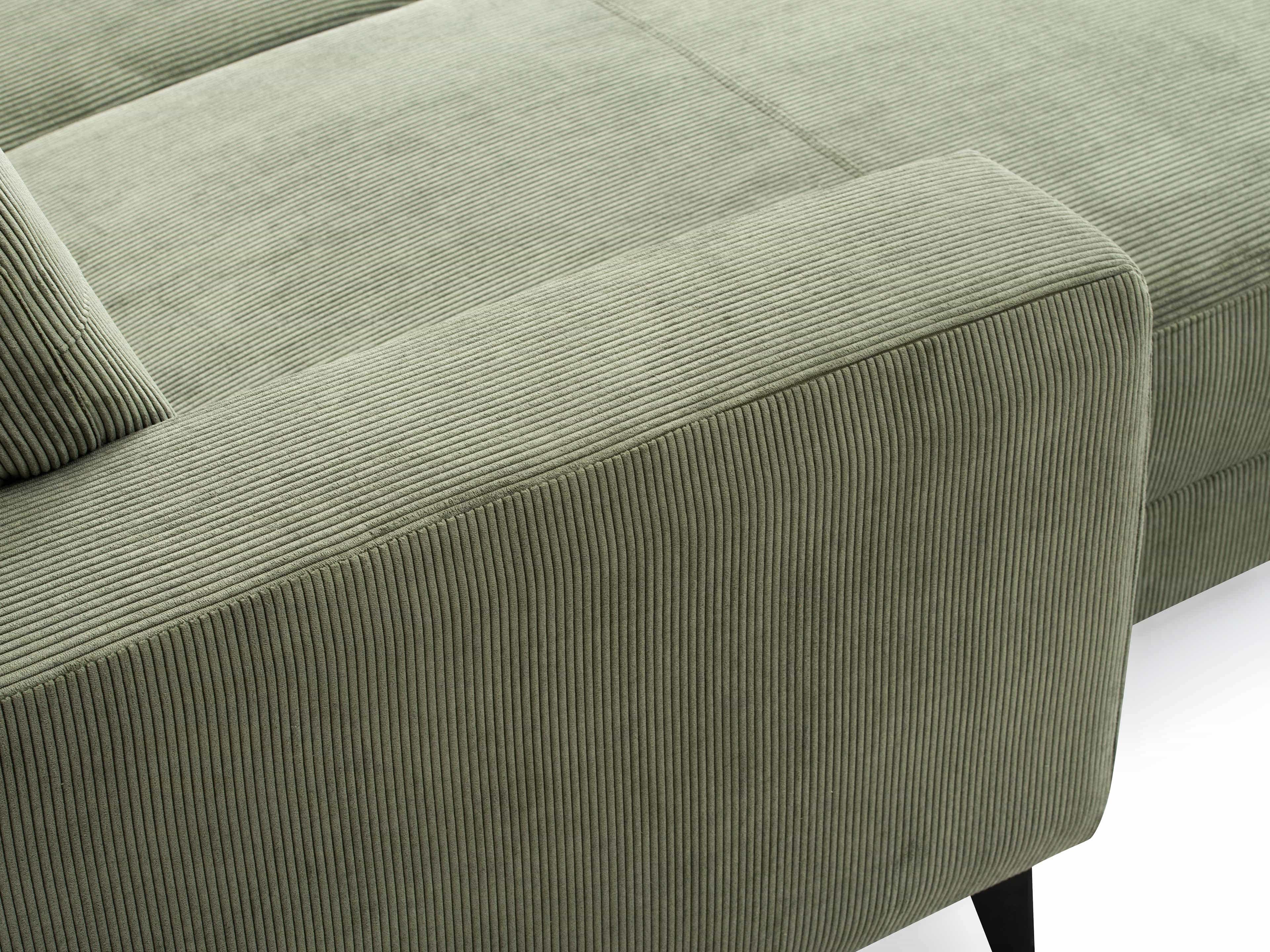 Ecksofa Karlson – Detailansicht mit grünem Cordbezug und breiter Armlehne