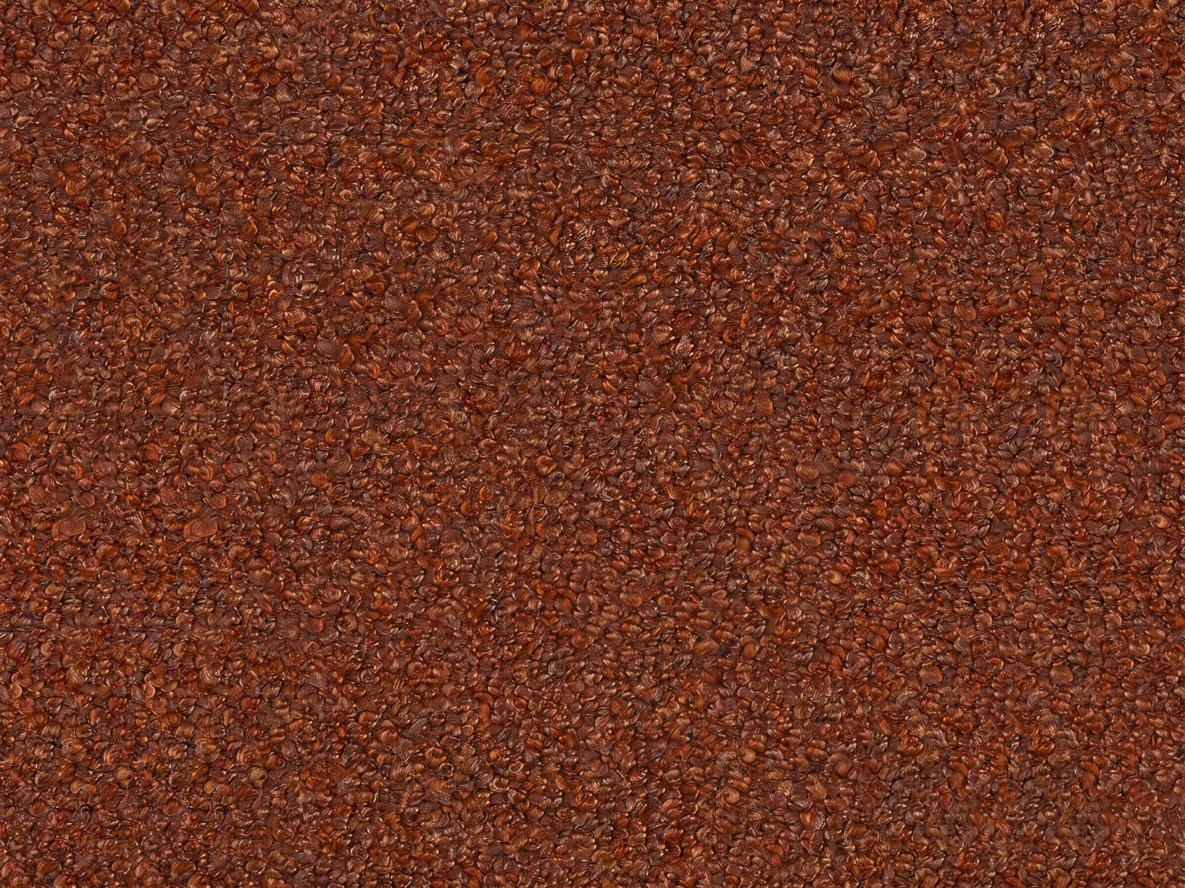 Brauner Strukturstoff mit grober, dichter Schlingenoberfläche und leicht glänzender Textur