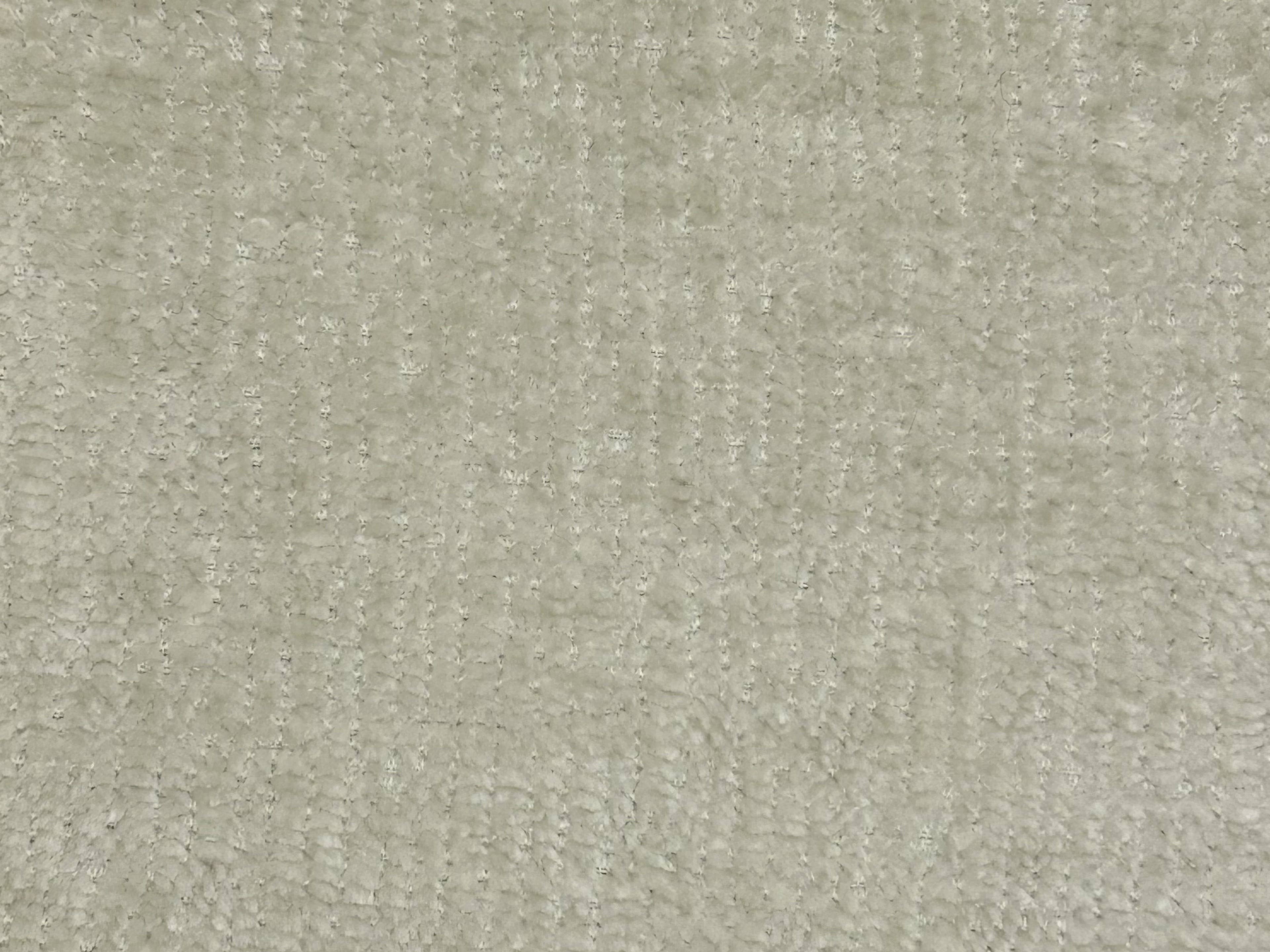 Strukturierter Stoffbezug in Beige mit weicher, samtig wirkender Oberfläche und dezenter Musterung