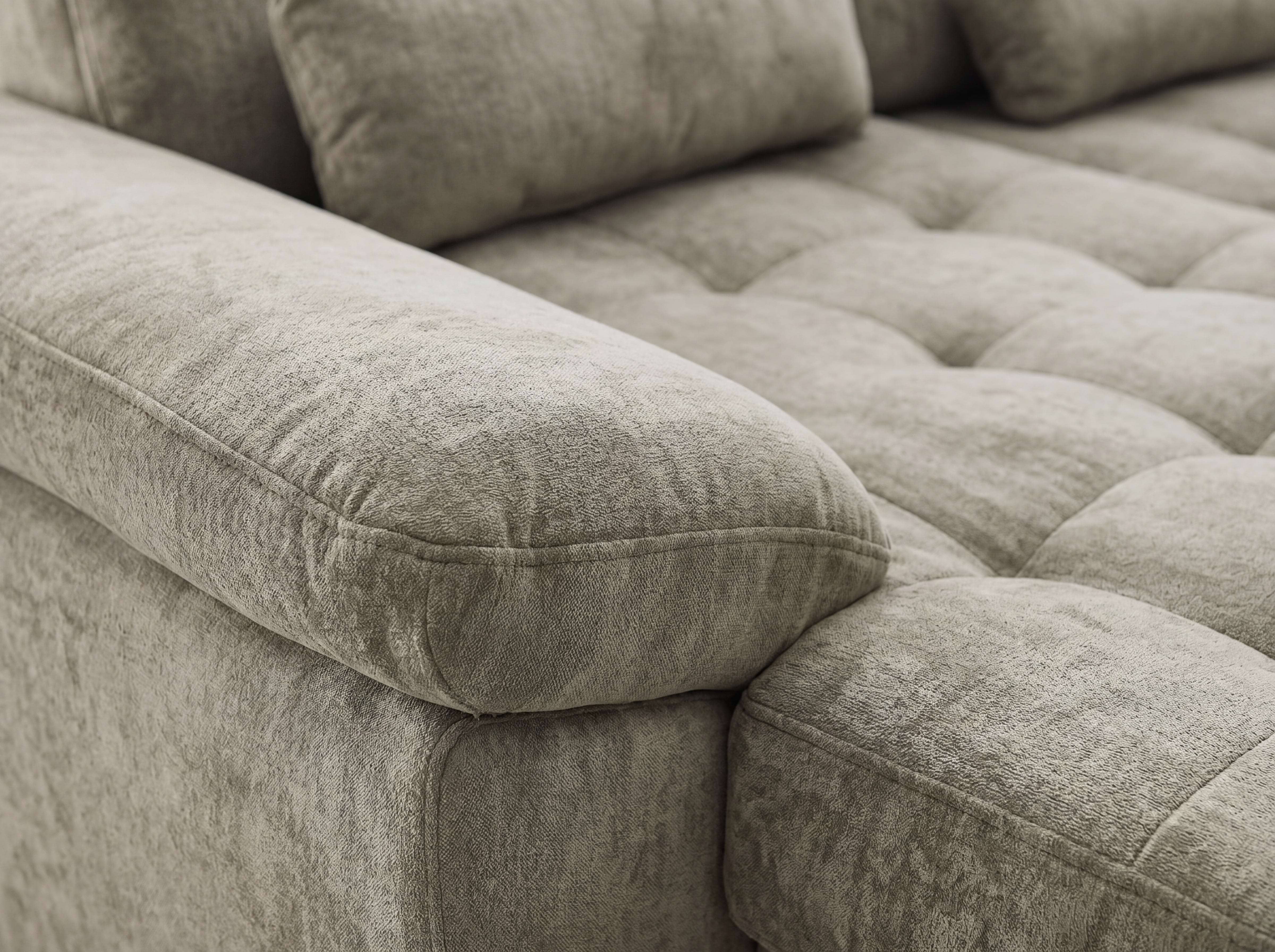 Ecksofa Kabs Polsterwelt mit beigefarbenem Stoffbezug, breiter Armlehne und gesteppter Sitzfläche