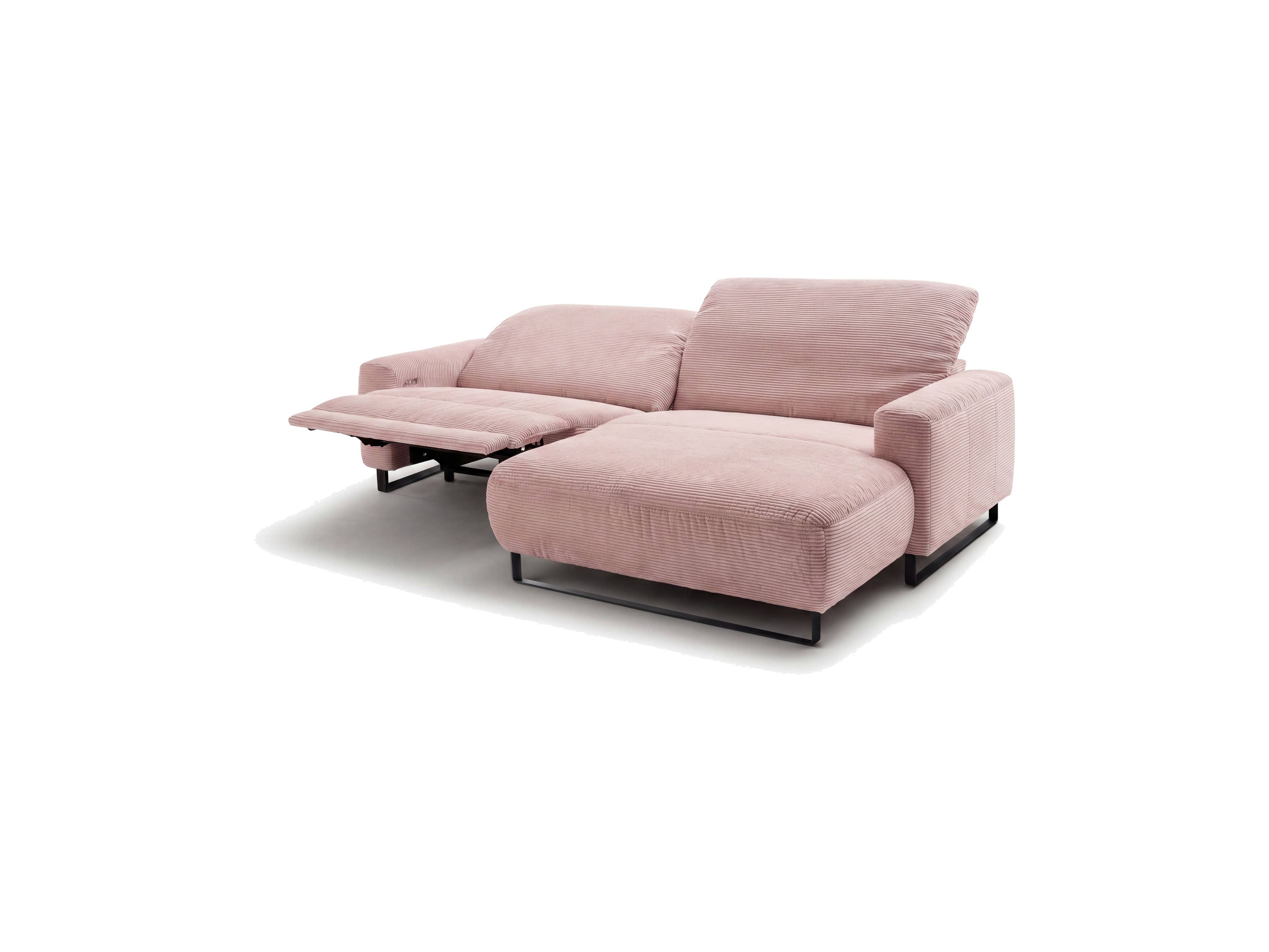 Ecksofa mit breiten Armlehnen aus rosa Cordstoff, sichtbarem Metallgestell und ausgeklappter Fußstütze