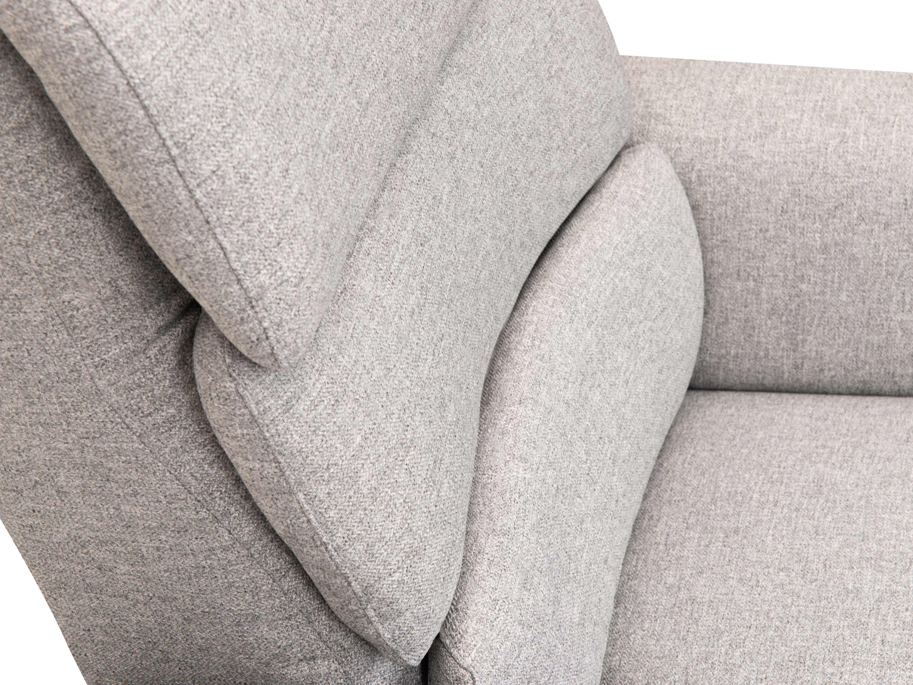Gepolstertes Sofa mit grauem Stoffbezug, hoher Rückenlehne und sichtbar ausgeformtem Seitenpolster.