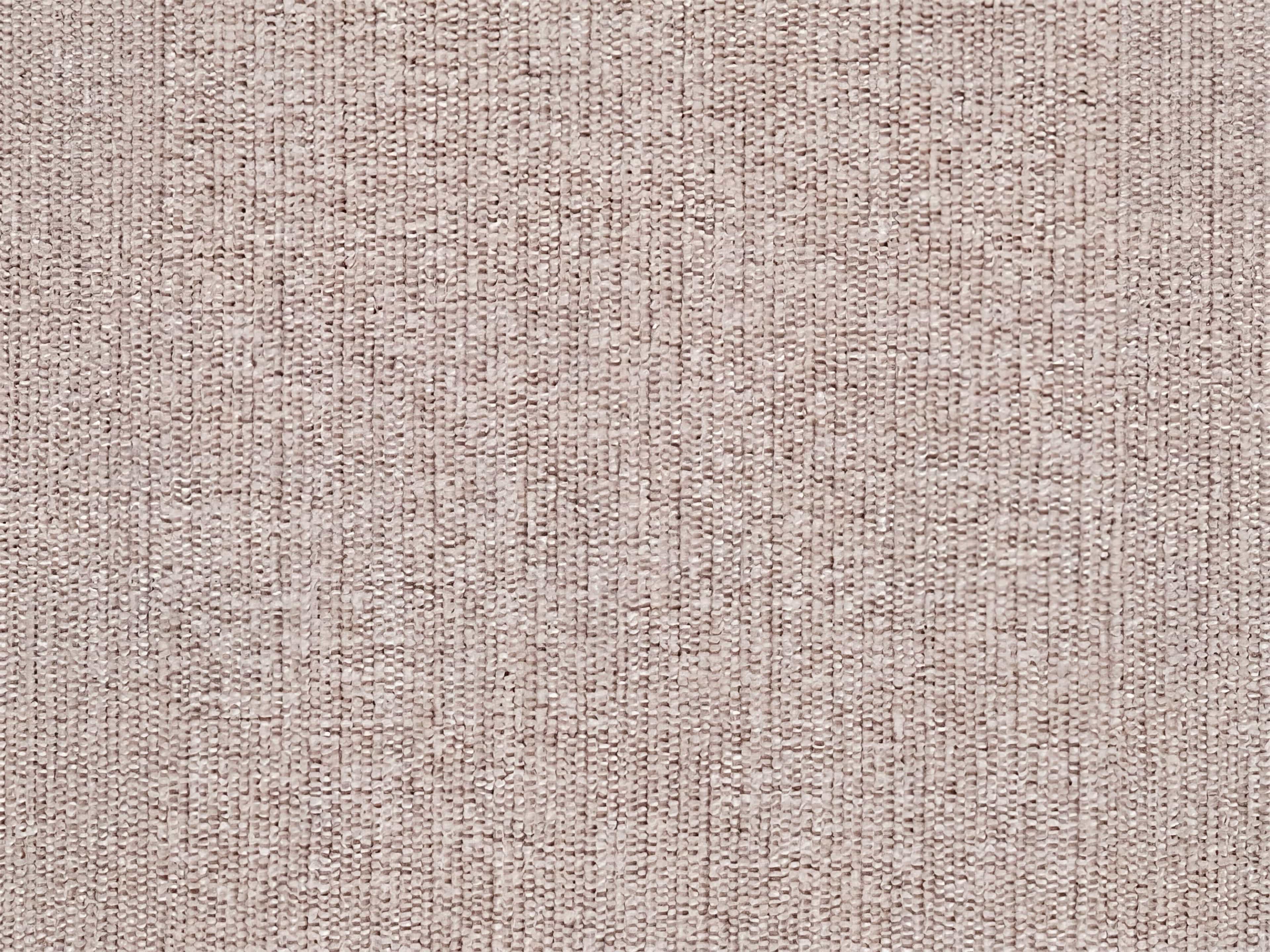 Bezugstoff in Beige mit feiner, sichtbarer Webstruktur und leicht strukturiertem Oberflächenbild