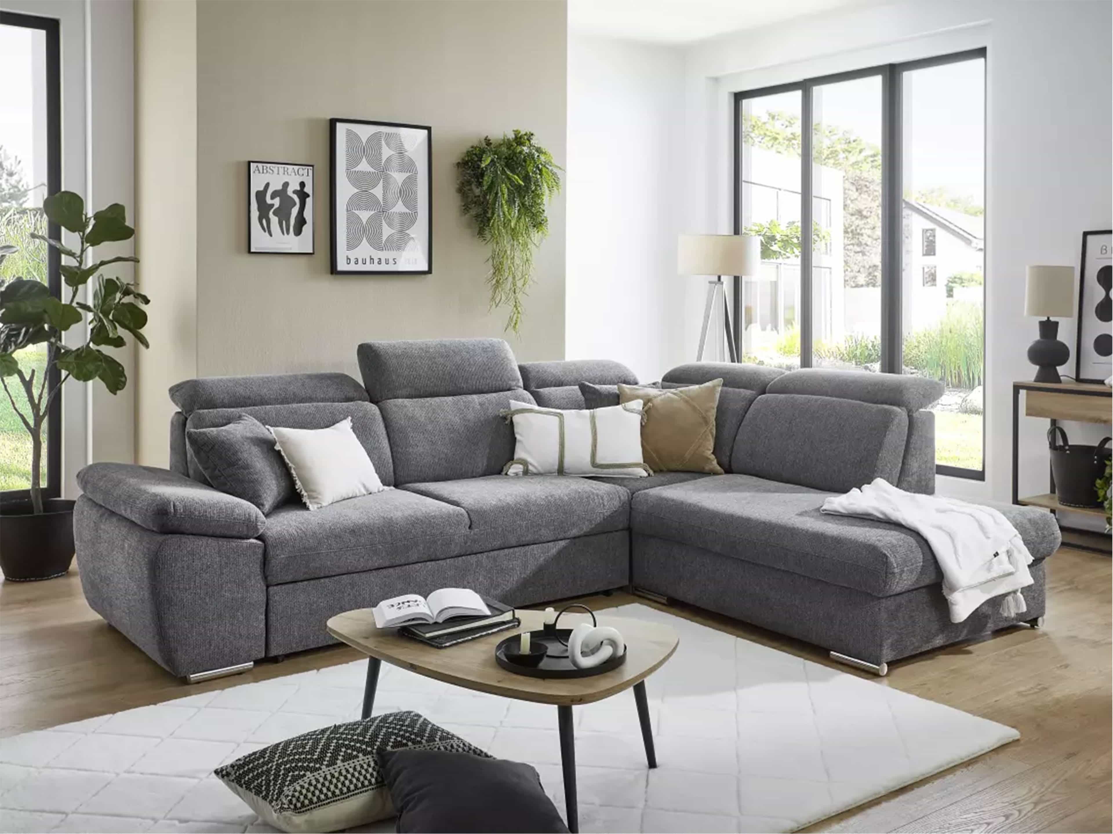Ecksofa Kabs Polsterwelt mit grauem Stoffbezug, breiten Armlehnen und verstellbaren Kopfstützen
