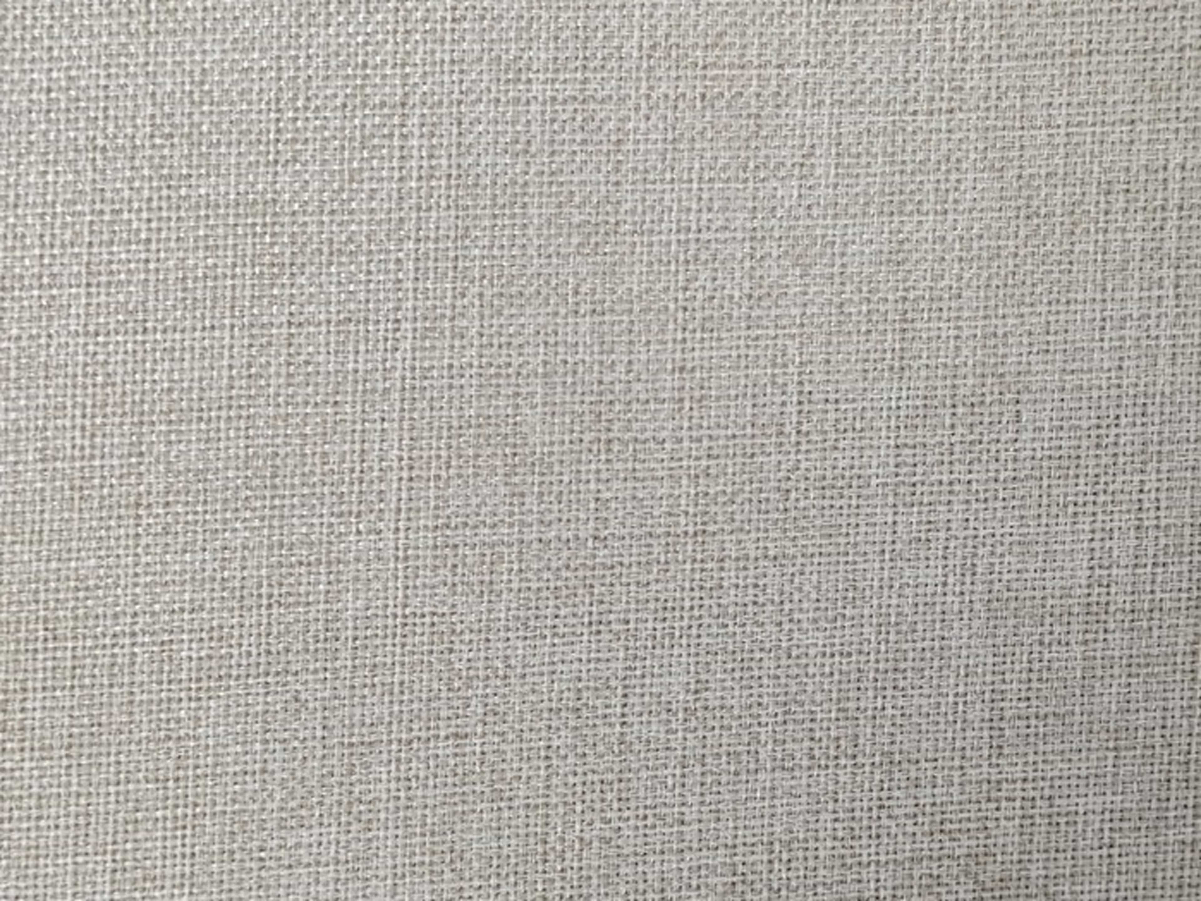Strukturierter Stoffbezug in Beige mit sichtbarer grober Webstruktur und leicht melierter Optik