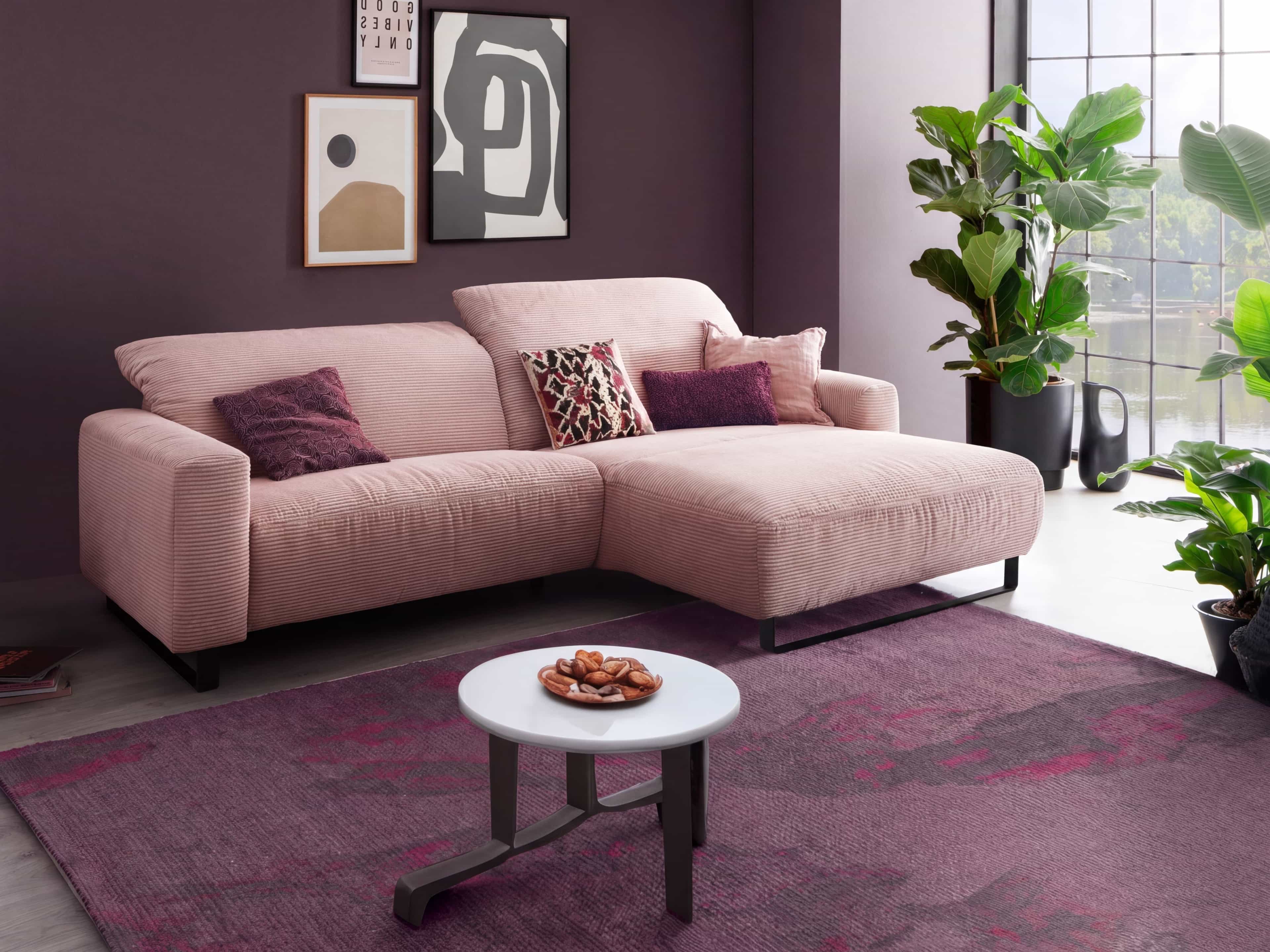 Ecksofa Kabs Polsterwelt aus rosafarbenem Stoff mit Armlehnen und schwarzem Metallgestell