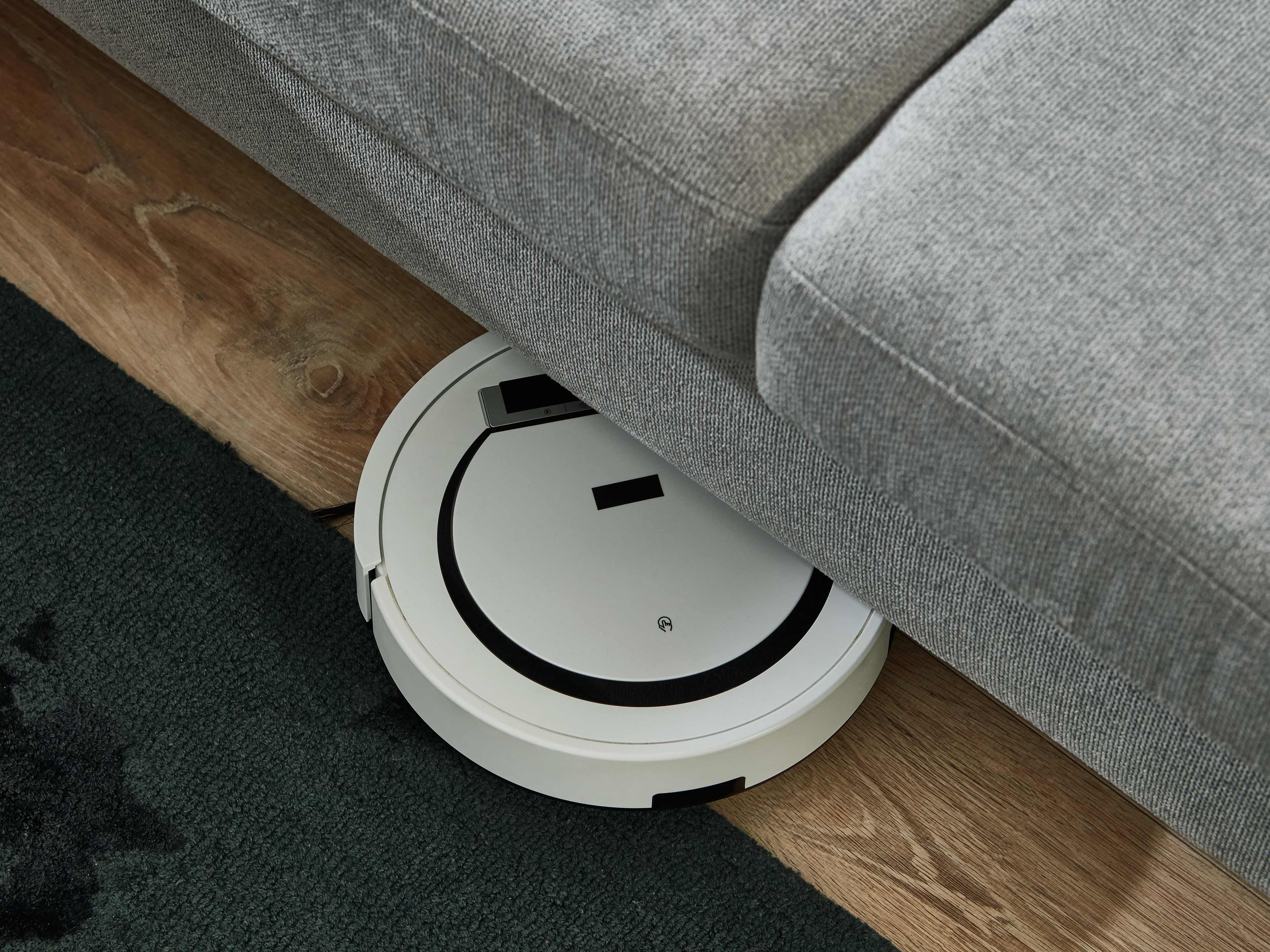 Ecksofa Kabs Polsterwelt in Grau mit Stoffbezug, rechteckigen Sitzflächen und sichtbarer Naht.