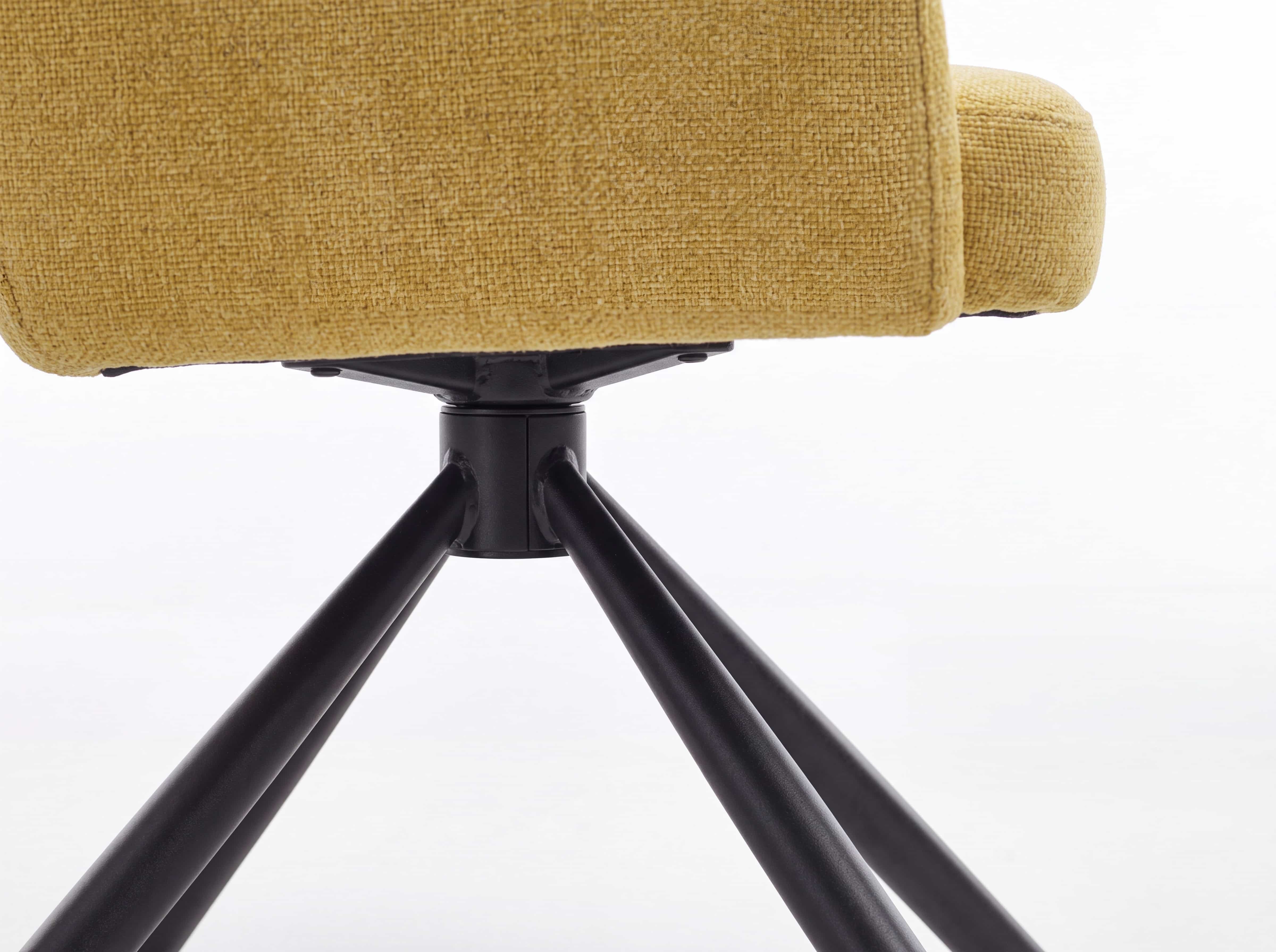 Esszimmerstuhl mit gelbem Stoffbezug und schwarzem Metallgestell in Vierbein-Ausführung