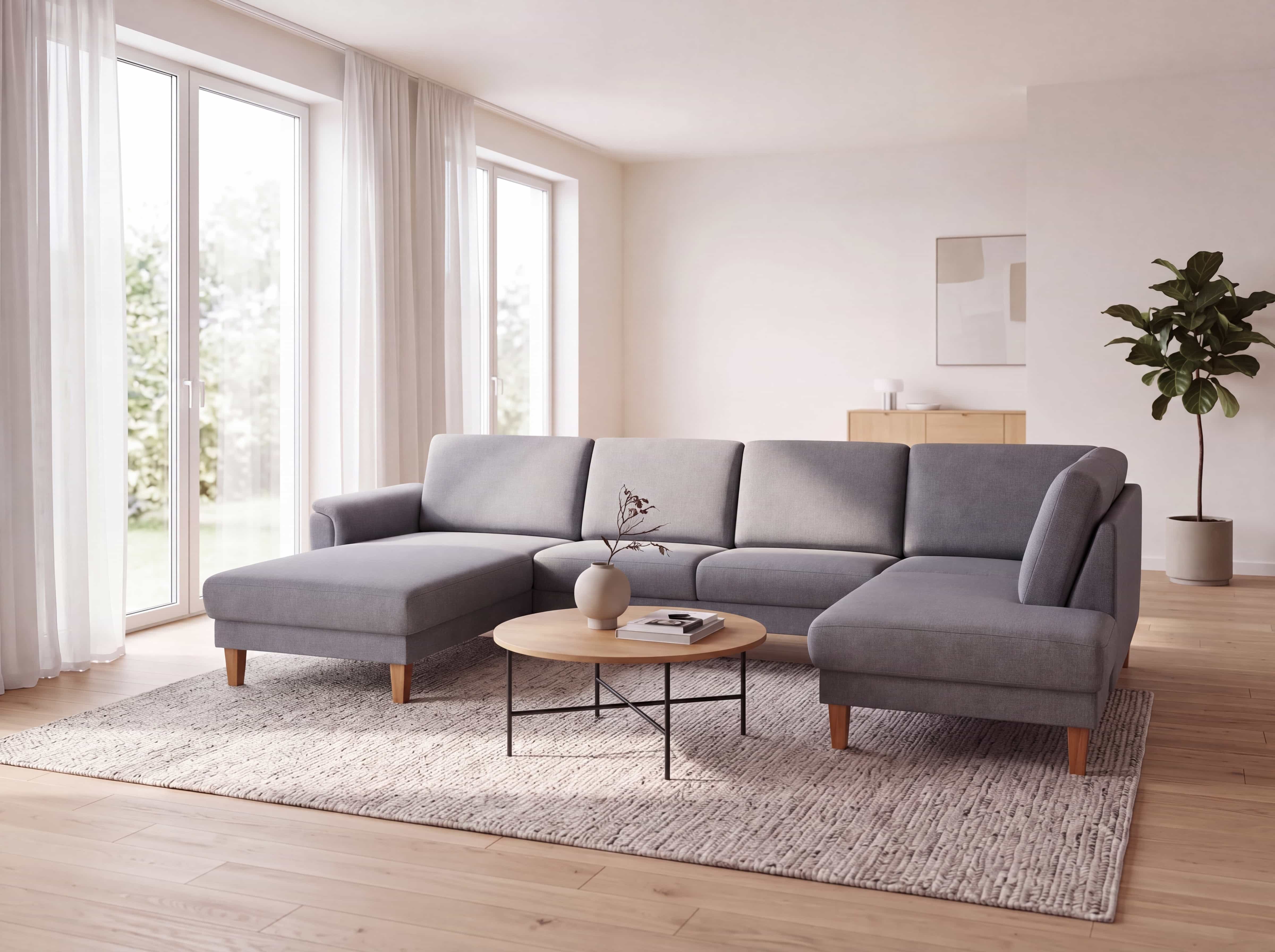 Ecksofa Kabs Polsterwelt mit grauem Stoffbezug, Holzfüßen, Armlehne und gepolsterter Rückenlehne