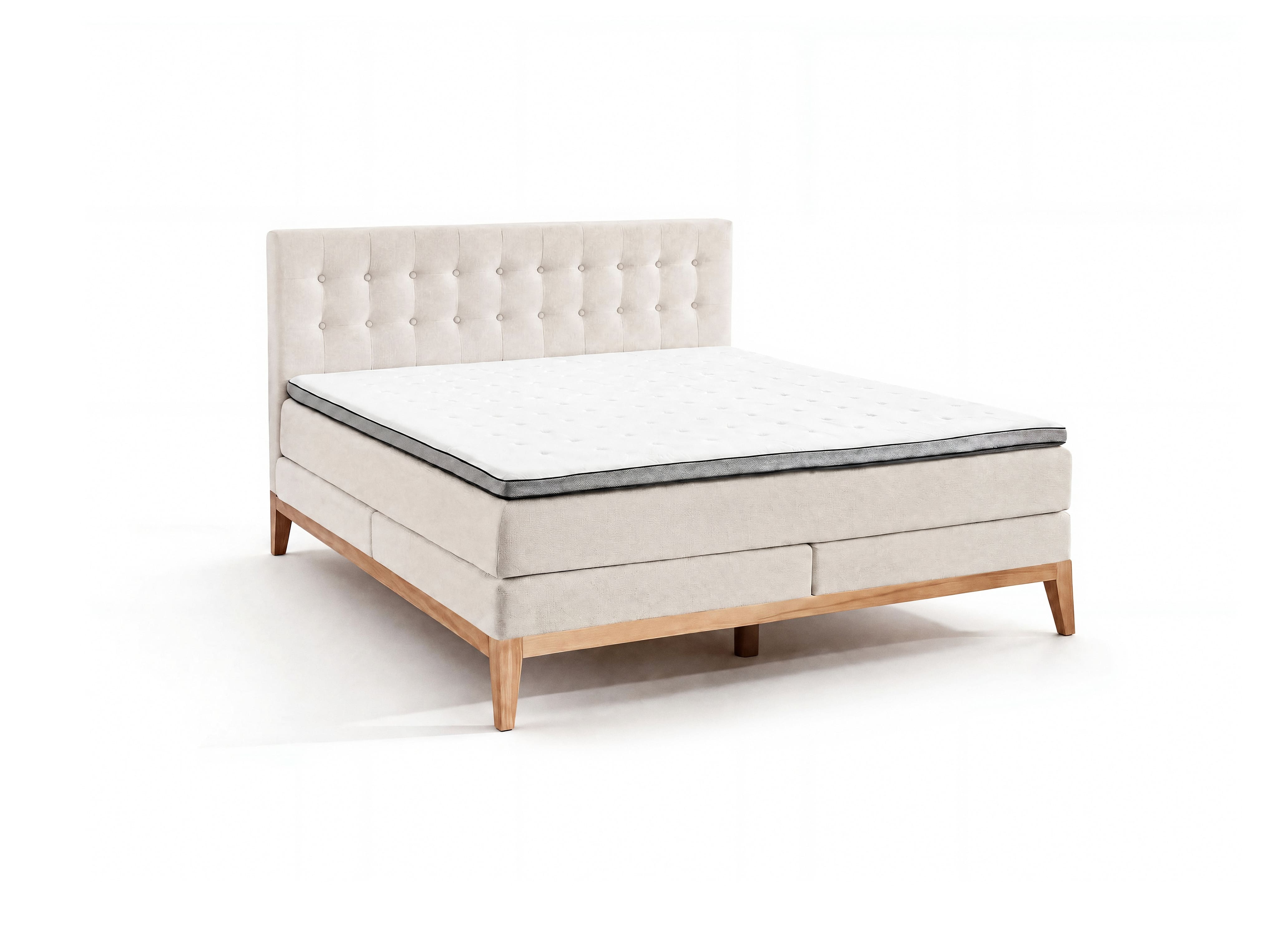 Boxspringbett Kabs mit hellbeigem Stoffbezug, gepolstertem Kopfteil mit Knopfheftung und Holzfüßen