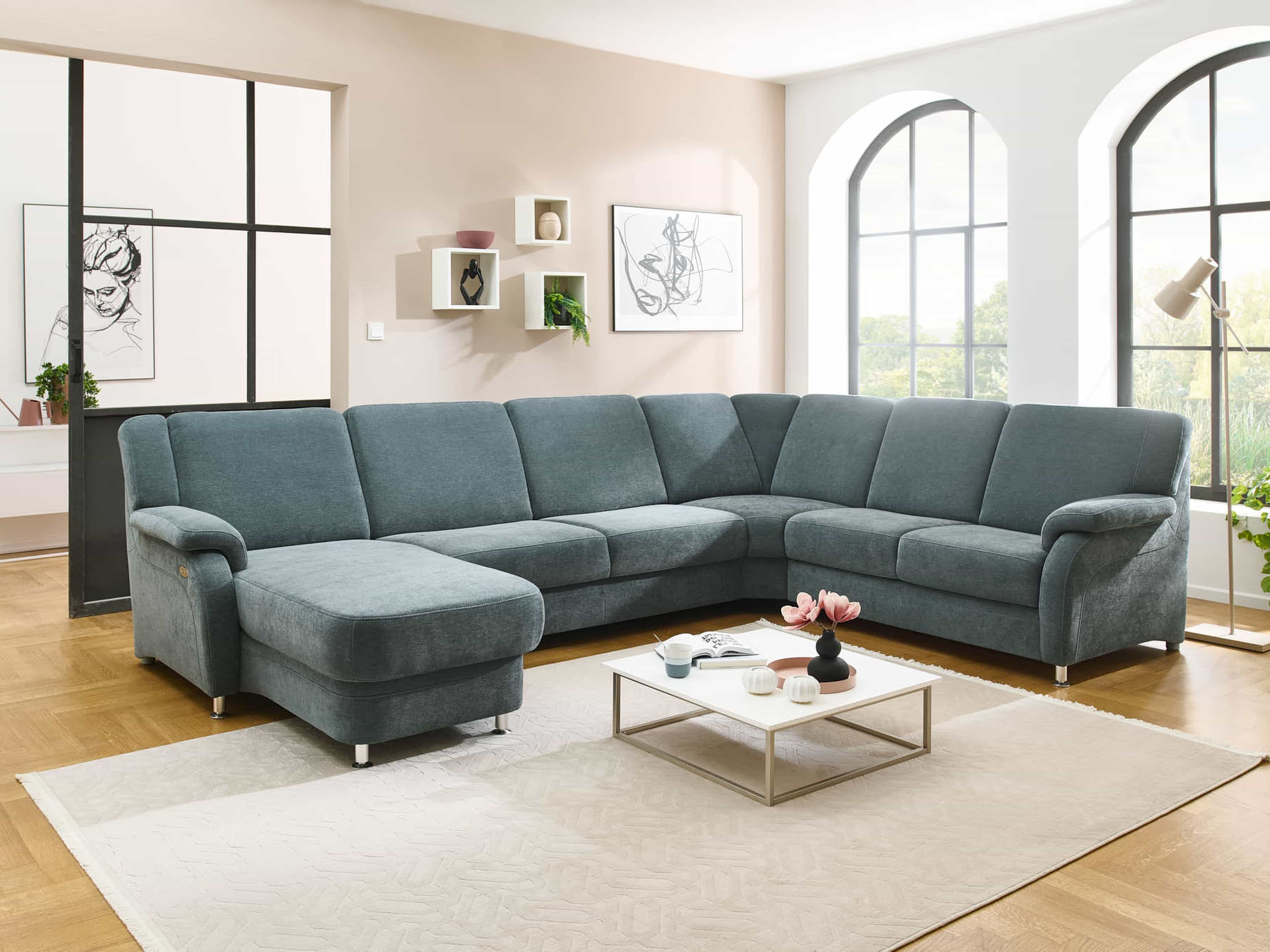 Ecksofa Tivoli mit grauem Stoffbezug, gepolsterter Rückenlehne und Armlehnen, silberne Füße